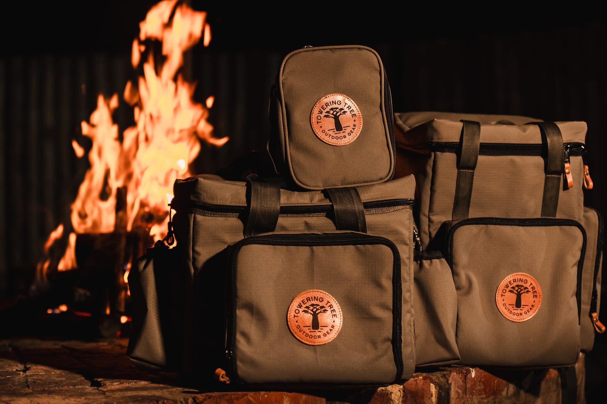 Full range of Towering Tree bags by the fire